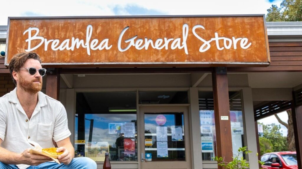 Man sitting in front of the Breamlea General Store